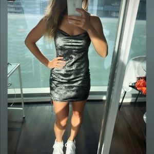 Metallic dress with gathering on the side